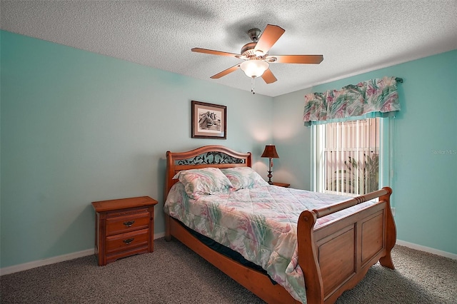 bedroom featuring light carpet, baseboards, and a textured ceiling