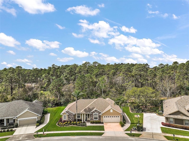 bird's eye view with a forest view