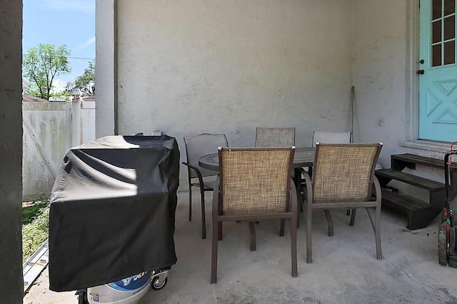 view of patio / terrace with entry steps and outdoor dining area