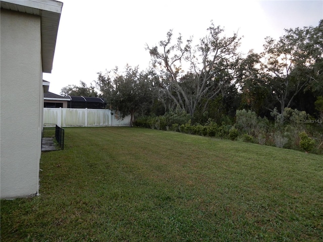 view of yard with fence