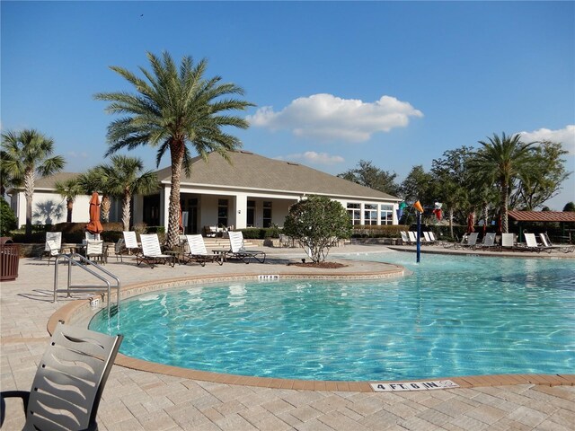 pool with a patio area