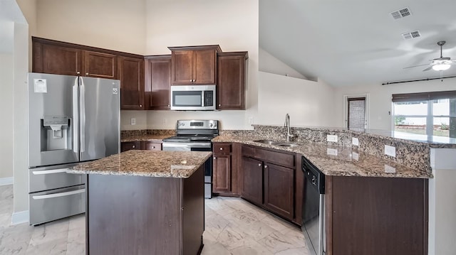 kitchen with stainless steel appliances, marble finish floor, visible vents, and a sink