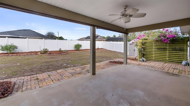 view of patio / terrace with a ceiling fan and a fenced backyard