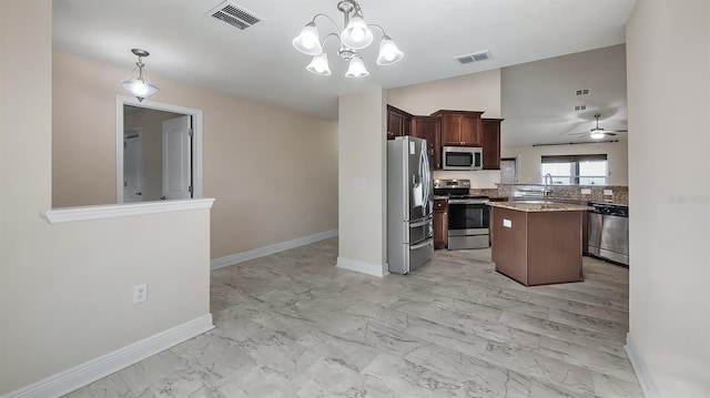 kitchen featuring appliances with stainless steel finishes, marble finish floor, and visible vents