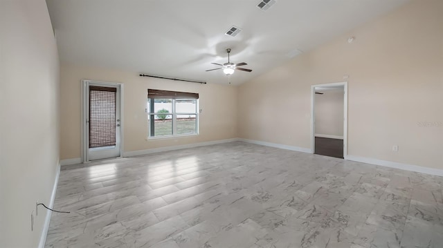 empty room featuring visible vents, baseboards, ceiling fan, marble finish floor, and vaulted ceiling