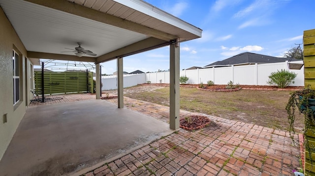 view of patio / terrace featuring a fenced backyard and a ceiling fan