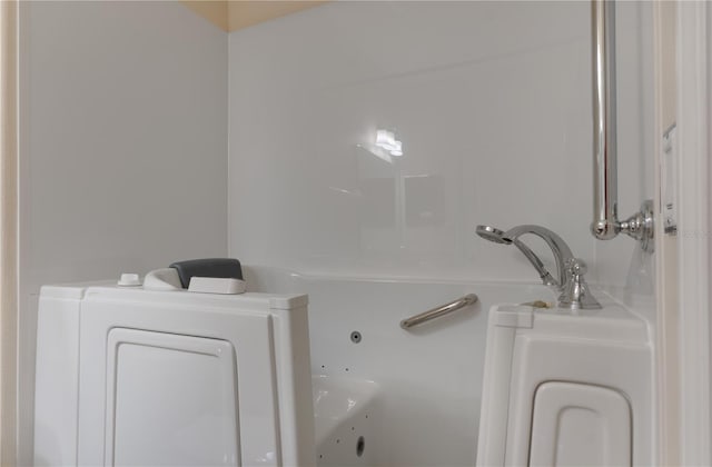 bathroom featuring a jetted tub