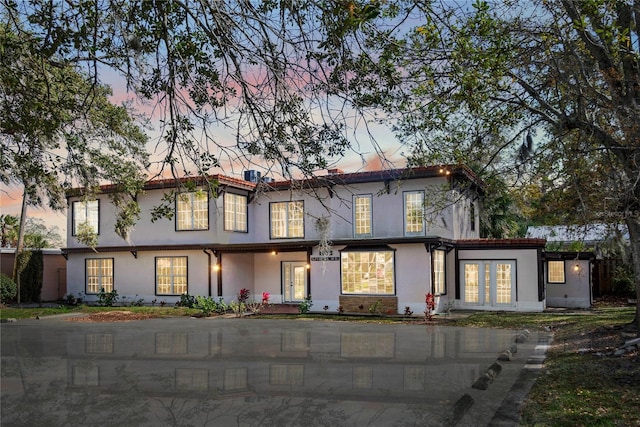 view of front of house featuring stucco siding