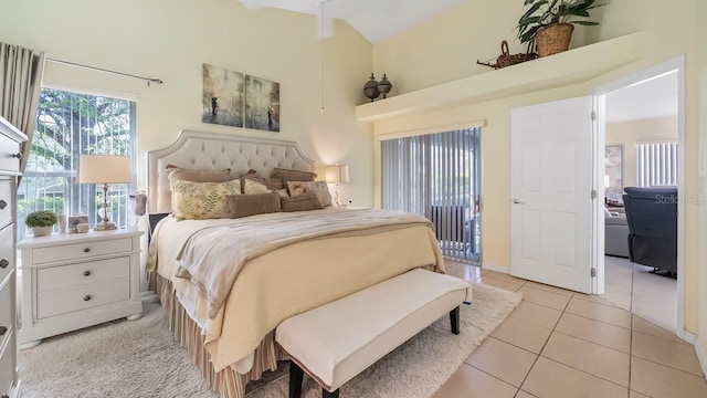 3773 Eversholt St, Clermont, FL 34711 - bedroom with light tile patterned floors and lofted ceiling