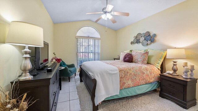 3773 Eversholt St, Clermont, FL 34711 - bedroom with vaulted ceiling, light tile patterned floors, and a ceiling fan