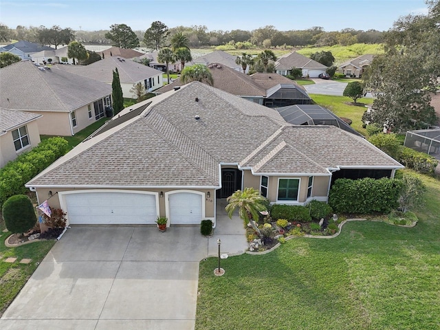 birds eye view of property with a residential view