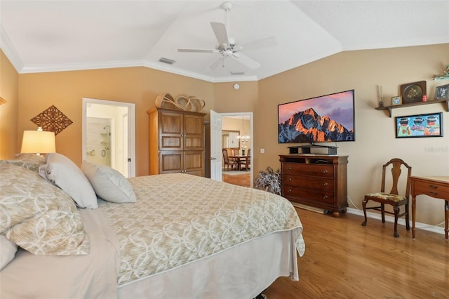 bedroom featuring visible vents, baseboards, lofted ceiling, ceiling fan, and light wood-style floors