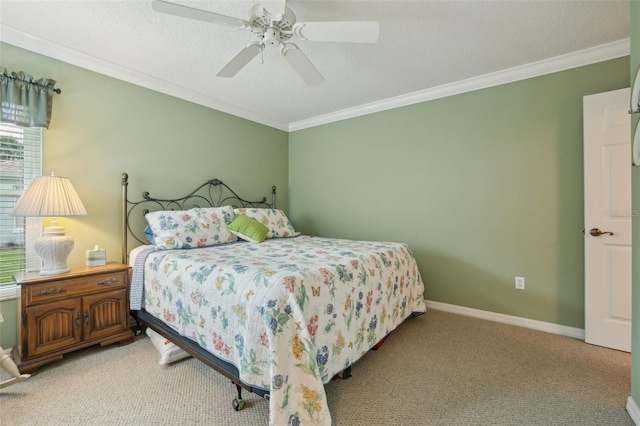 bedroom featuring a textured ceiling, carpet floors, crown molding, baseboards, and ceiling fan