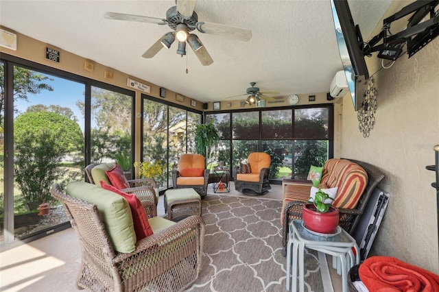 sunroom with ceiling fan and a wall unit AC