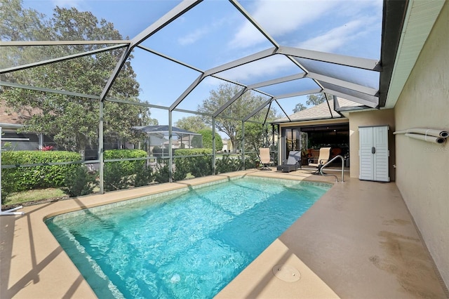 pool with a patio and a lanai