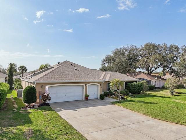 ranch-style home with a front lawn, concrete driveway, stucco siding, central AC unit, and a garage