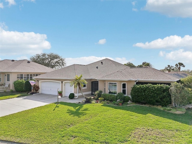 view of front of home featuring stucco siding, a front lawn, driveway, a shingled roof, and a garage