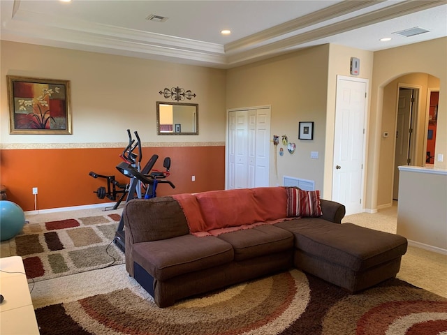 5271 Visionary Ct, Sarasota, FL 34233 - living area featuring arched walkways, carpet flooring, a raised ceiling, crown molding, and recessed lighting