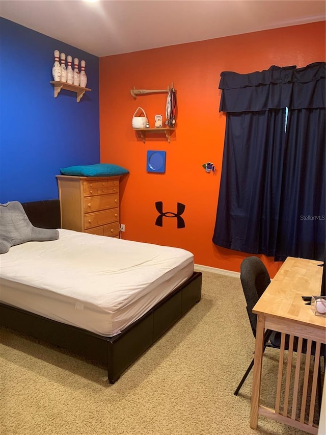 5271 Visionary Ct, Sarasota, FL 34233 - carpeted bedroom with baseboards