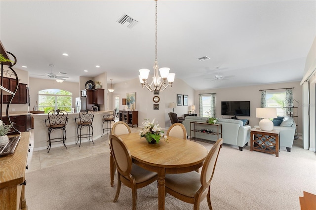 dining area with a healthy amount of sunlight and visible vents