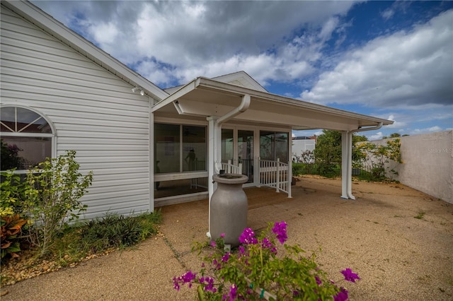 view of patio / terrace featuring fence