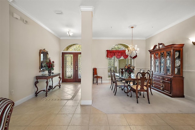 dining space featuring a chandelier, light tile patterned floors, visible vents, baseboards, and ornamental molding