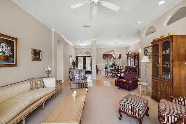 living area with ornamental molding, recessed lighting, french doors, and visible vents