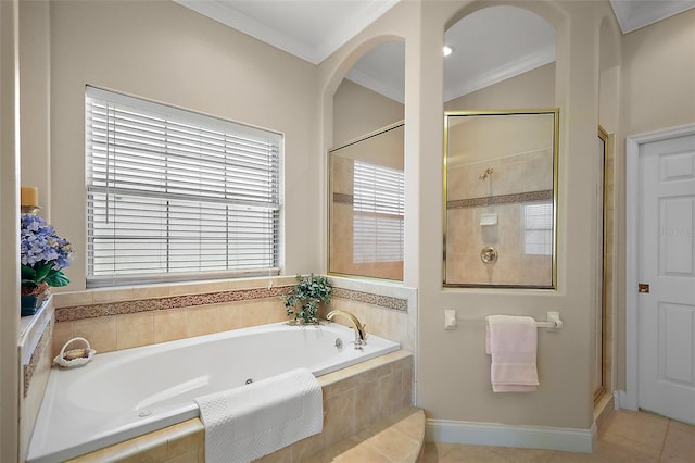 full bathroom with a stall shower, baseboards, ornamental molding, tile patterned floors, and a garden tub