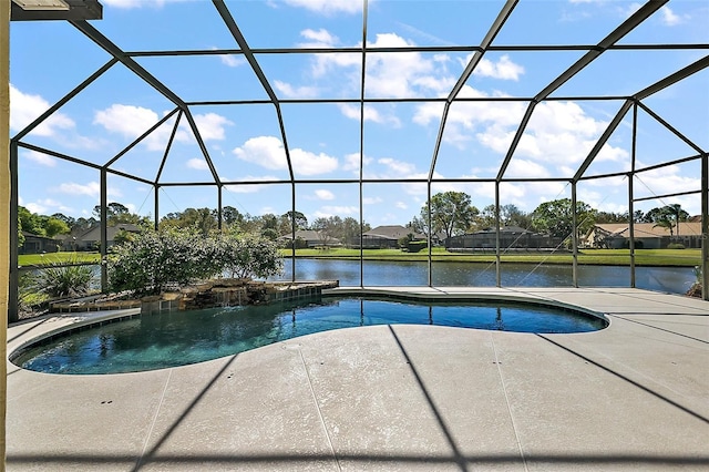 view of swimming pool with a pool with connected hot tub, glass enclosure, a patio, and a water view