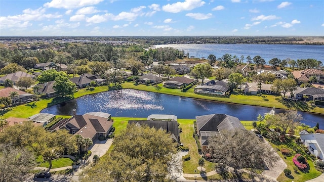 aerial view featuring a residential view and a water view