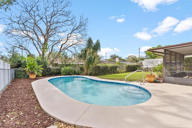 view of swimming pool featuring a fenced in pool, a sunroom, and a fenced backyard