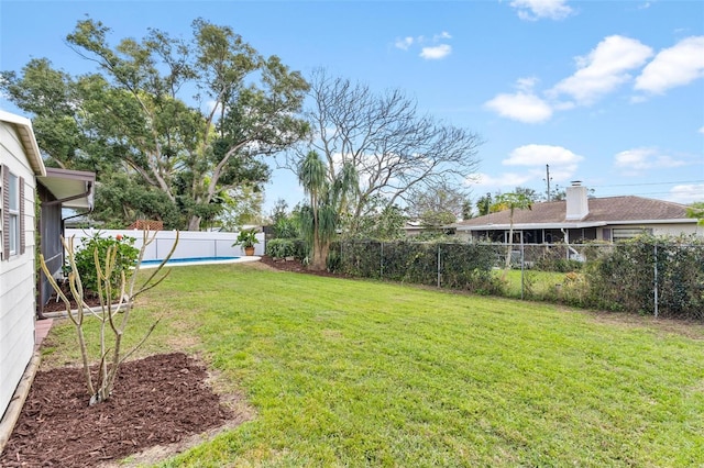 view of yard with a fenced backyard and a fenced in pool