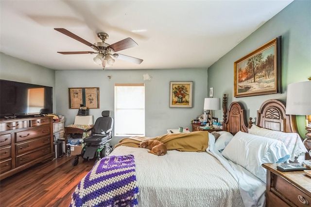 bedroom with dark wood finished floors and a ceiling fan