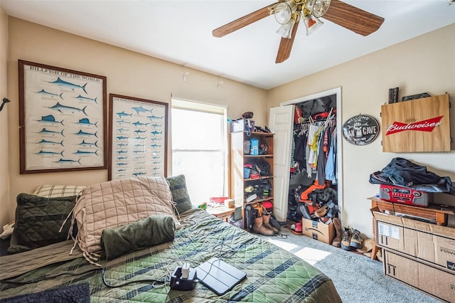 bedroom featuring ceiling fan, carpet floors, and a closet