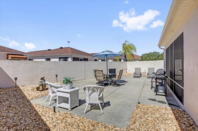 view of patio / terrace with outdoor dining area and a fenced backyard