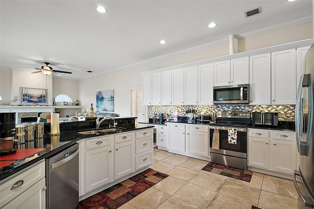 kitchen with white cabinetry, visible vents, appliances with stainless steel finishes, and a sink