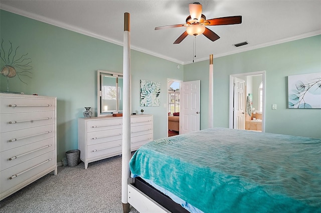 bedroom featuring connected bathroom, carpet flooring, a ceiling fan, visible vents, and ornamental molding