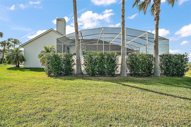 view of yard featuring a lanai