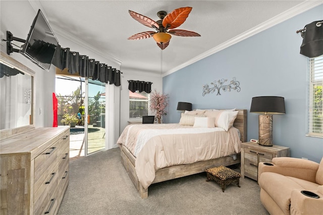 carpeted bedroom featuring ceiling fan, multiple windows, ornamental molding, and access to outside