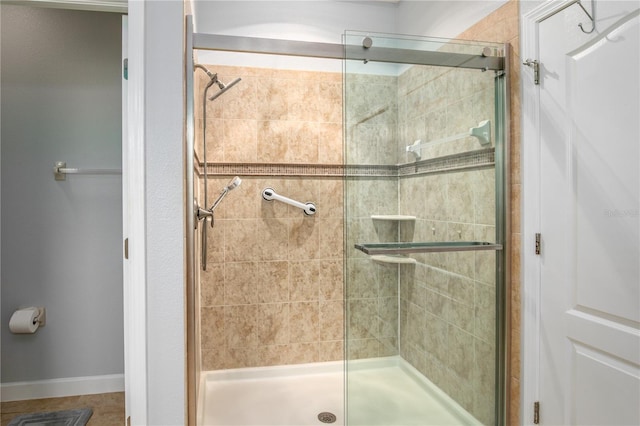 bathroom with a shower stall