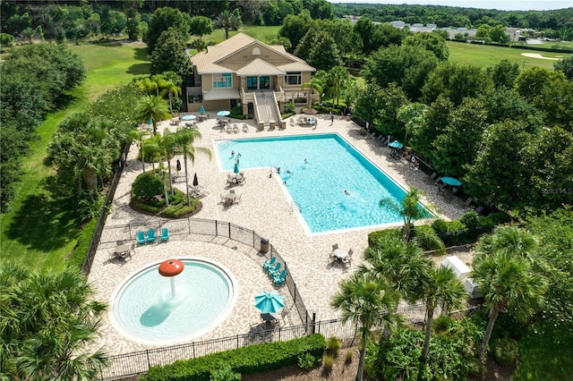 pool featuring fence, stairs, and a patio area