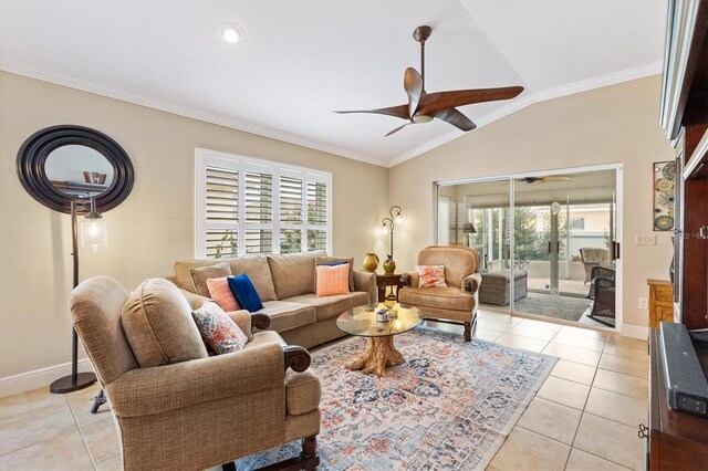 living area featuring lofted ceiling, baseboards, a ceiling fan, and light tile patterned flooring