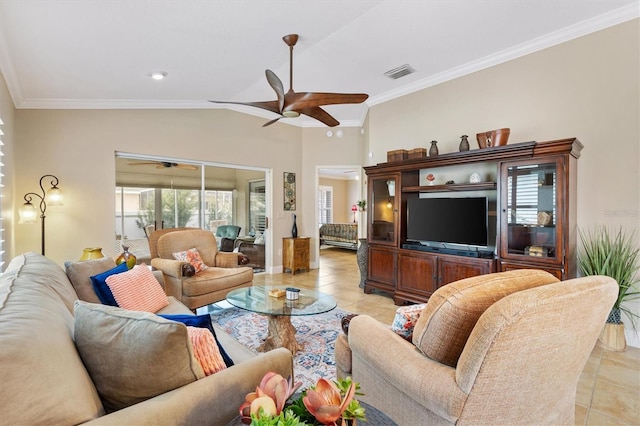 living area featuring light tile patterned floors, visible vents, a ceiling fan, and ornamental molding