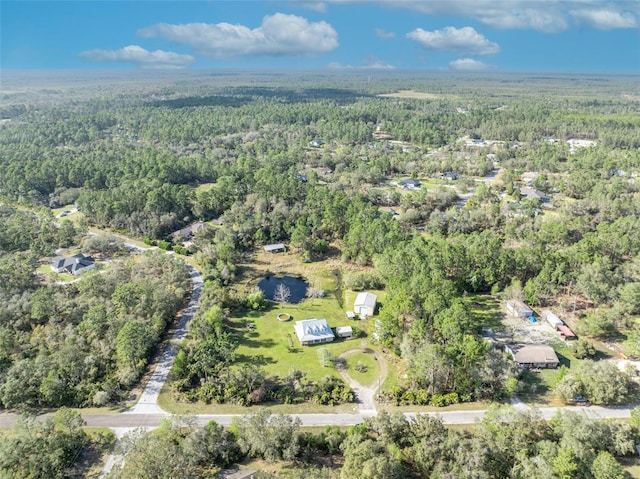 aerial view with a wooded view