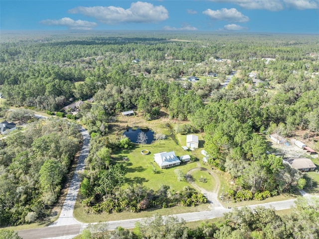 bird's eye view featuring a view of trees