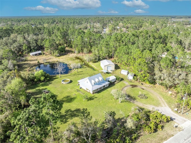 aerial view featuring a view of trees