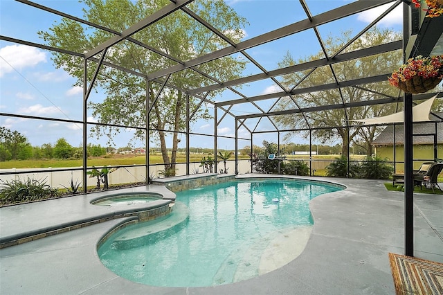 view of swimming pool with a patio area and glass enclosure