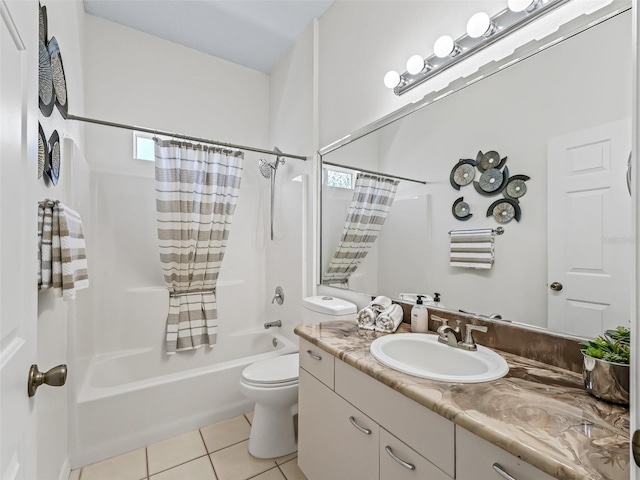 full bathroom featuring shower / tub combo, vanity, toilet, and tile patterned floors