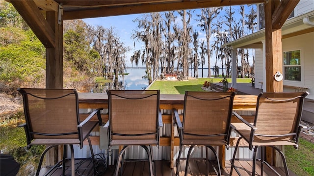 view of patio / terrace with a water view