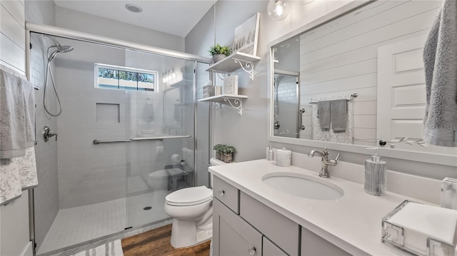 12117 Cypress Ln, Clermont, FL 34711 - full bath with a stall shower, vanity, and wood finished floors